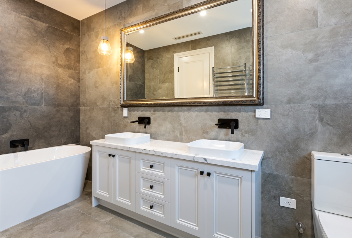 ensuite-bathroom-in-grey-tiles-and-2-pack-white-vanity